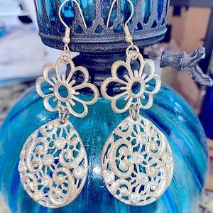 Silver with Flowered top & decorated round bottom